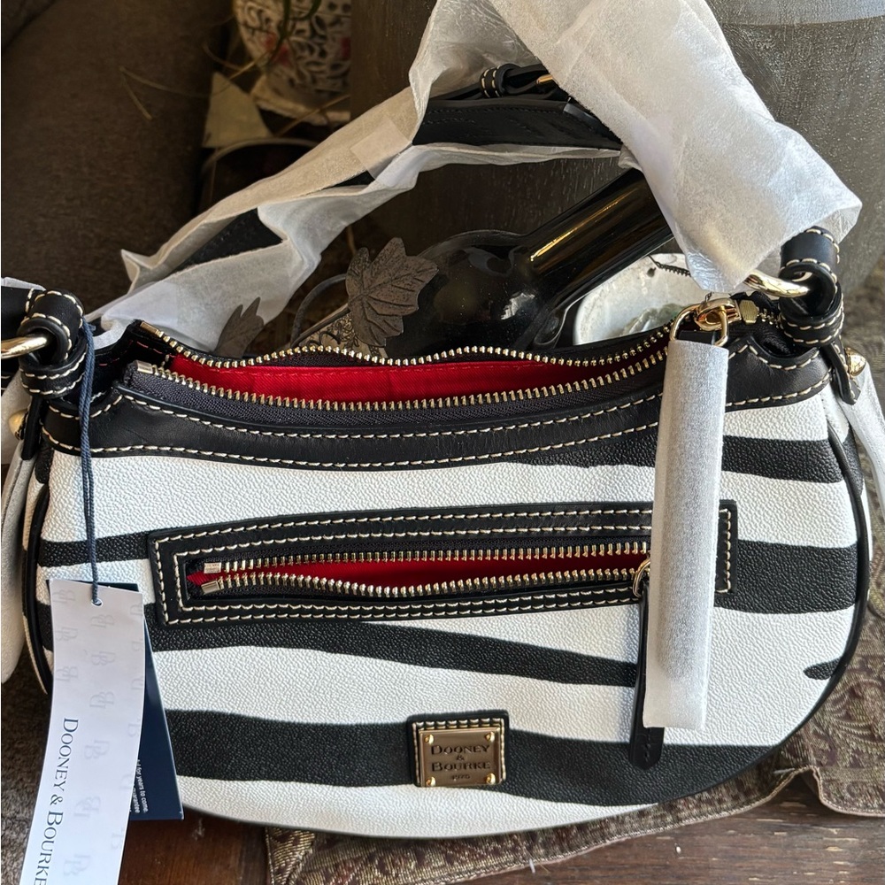 Authentic Dooney & Bourke leather Zebra Print zip top shoulder Bag